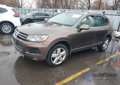 2012 Volkswagen Touareg Vr6 Lux z USA, uszkodzony, nr VIN WVGFF9BP8CD004622